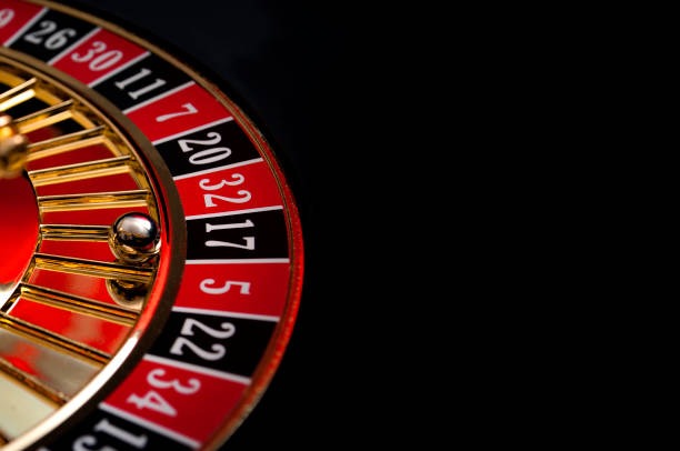 Live dealer studio with roulette and baccarat tables